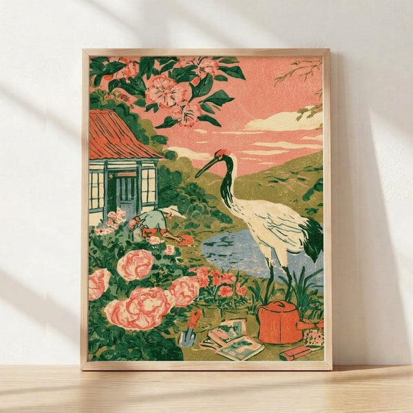Framed vintage Japandi poster featuring a serene garden scene with a graceful crane, blooming roses, and a cottage by water, rendered in soft coral pink, forest green, and cream tones.
