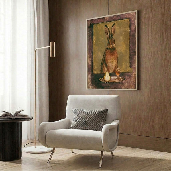 Framed impressionist-inspired artwork depicting a hare with a pear and burgundy wine in delicate gold and brown hues, evoking a whimsical, storybook mood.
