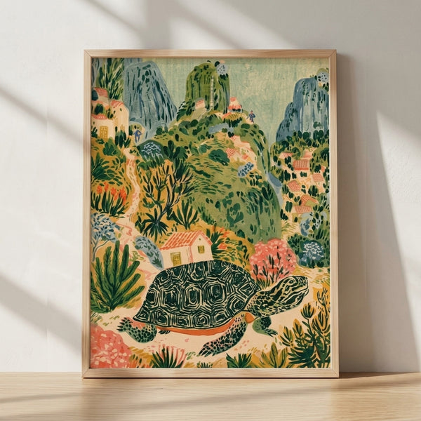 Whimsical folk art landscape depicting a tortoise wandering through a Mediterranean hillside village with cream-colored cottages, olive green vegetation, and golden yellow accents, framed as a poster on a wall.