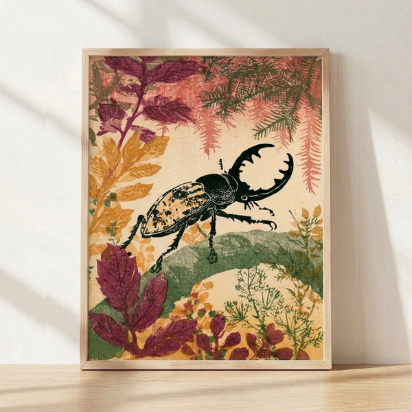 Vintage woodblock-style framed poster featuring a detailed stag beetle in burgundy and black alongside fern leaves and botanical elements in forest green and ochre on cream background.