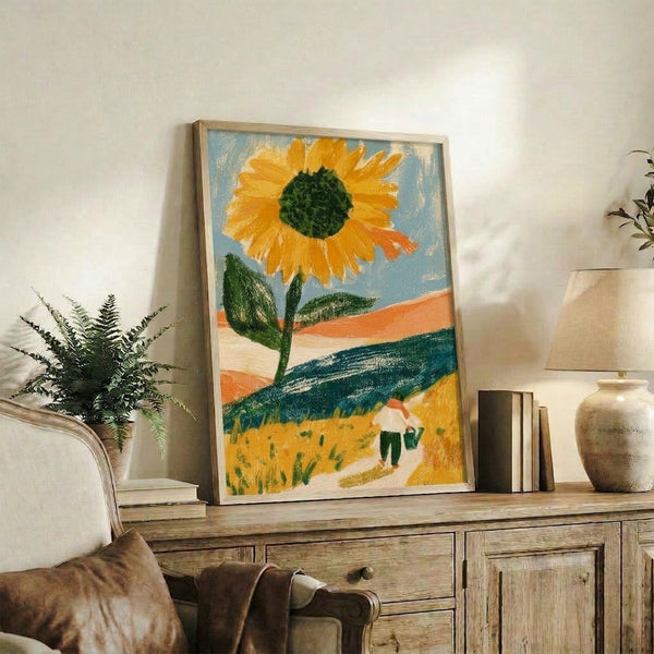 Cottagecore wall art depicting a serene sunflower landscape with a solitary figure and watering can, blending vintage retro aesthetics with golden and slate blue watercolor tones.