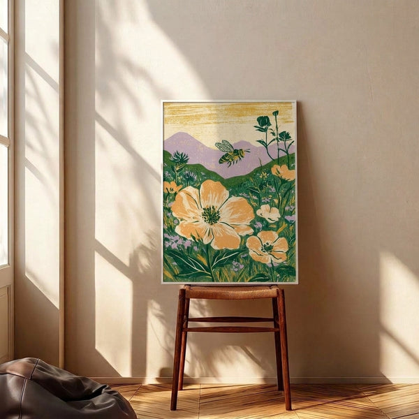 Cottage-inspired wall art showcasing a bee in a wildflower meadow with distant mountains, painted in a soft vintage style using warm creams, forest greens, and touches of golden yellow and lavender.