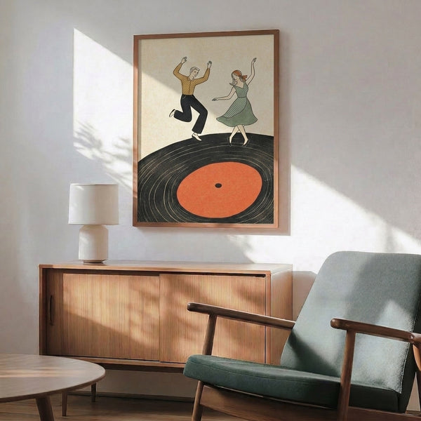Retro framed art print of a couple dancing joyfully around vinyl records in warm cream and tan tones with black details, evoking nostalgic mid-century charm.