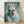 Pop art framed poster of a stylish French Bulldog wearing a fur stole and jewelry, rendered in seafoam green, turquoise, and rose gold tones against a cream background.