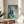 Contemporary wall poster featuring a glamorous French Bulldog in Vogue-inspired styling, complete with statement jewelry and a fur stole, rendered in playful pop art with soft turquoise and cream tones.