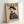 Playful pop art poster of a fashion-forward dog sporting a beret and scarf, combining sophisticated humor with vibrant cream, burgundy, and denim blue palette.