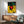 Framed modernist print of soaring birds rendered through playful abstract composition with bold shapes and vibrant color contrasts.