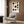 Serene ink painting-style poster displaying gestural black circles and brushwork on a neutral background, ideal for zen-inspired interiors.