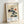 Minimalist Japanese flower study of a chrysanthemum in cream, indigo, and coral tones, celebrating wabi-sabi aesthetic of impermanence.