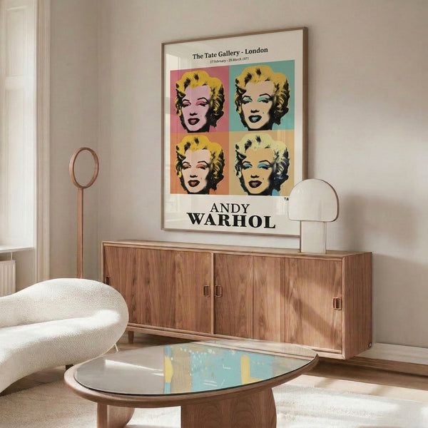 Framed Marilyn Monroe pop art print featuring striking hot pink and burnt orange against cream, in bold retro gallery style.