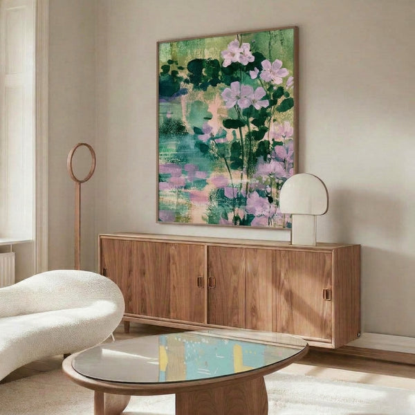 Soft watercolor illustration of blooming lavender and verdant garden foliage rendered in muted mauve, green, and cream tones, framed as serene boho wall decor.