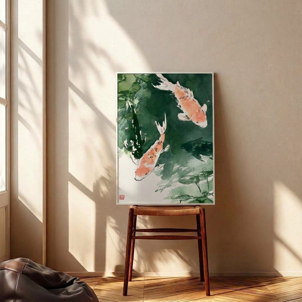 Japanese woodblock-influenced watercolor artwork of koi fish among aquatic plants in calming forest and sage greens with coral accents, framed on wall.