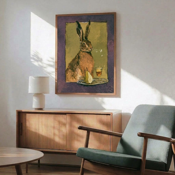 Charming watercolor poster depicting a rabbit with amber wine glass and fresh pear, complemented by daisy blooms in muted sage and warm brown tones.