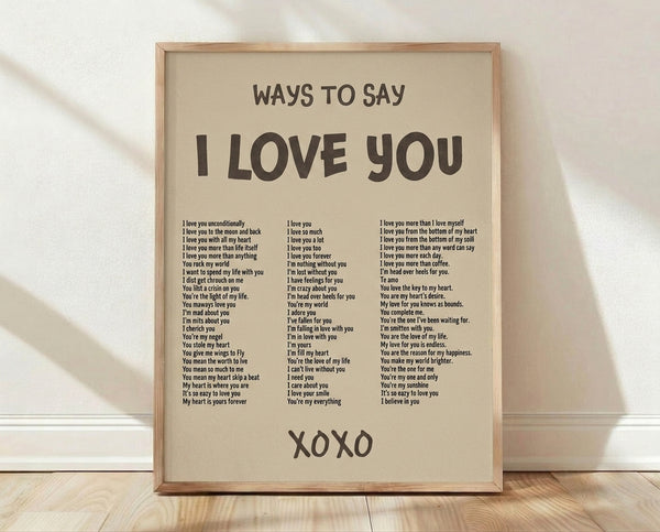 Minimalist typography poster featuring romantic phrases in charcoal and beige tones, framed on a wall as heartfelt home decor.