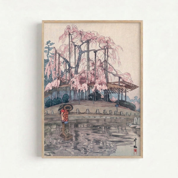 Framed Japandi art print depicting a contemplative scene of a weeping willow garden with architectural elements, rendered in traditional woodblock style with soft pink and blue-grey hues.