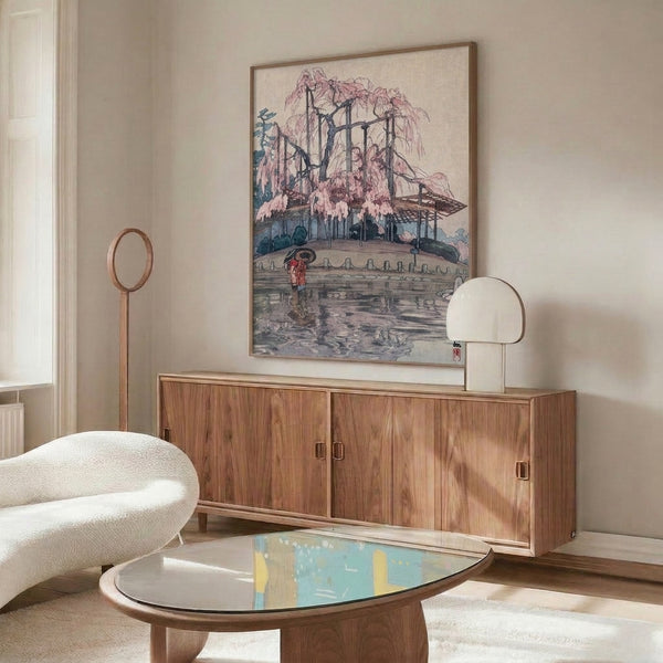 Serene woodblock print featuring a willow tree garden with architectural structures and a contemplative figure, combining traditional Japanese techniques with a refined palette of cream, teal, and rose hues.
