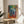 Framed wall art of Monet's weeping willow with soft, impressionistic brushstrokes and a calming palette of sage and blue hues.