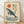 Serene Japanese woodblock-inspired poster featuring a whale in teal-blue waters beneath a rust-orange sun, framed on a wall in minimalist japandi style.