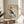 Minimalist japanese whale illustration with sun and water elements in soft earth and ocean tones, displayed as a framed wall art print.