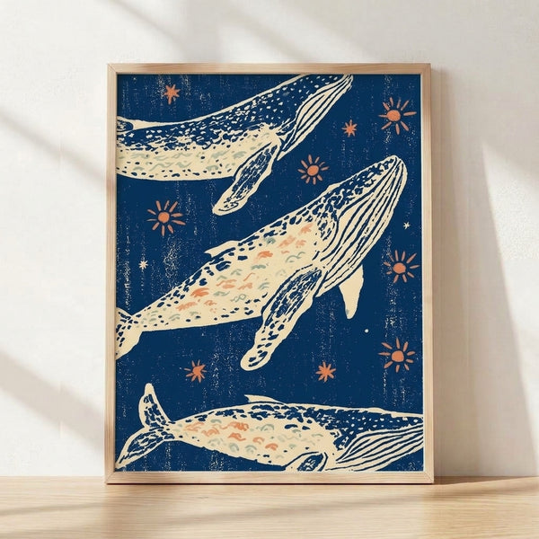 Serene minimalist poster featuring a whale silhouette swimming beneath suns and stars in deep navy and cream tones, evoking peaceful ocean wonder in Japandi style.