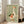 Charming cottagecore-style bird illustration featuring a playful goose with a red heart wing and botanical details in warm, muted earth tones, displayed as a framed poster.