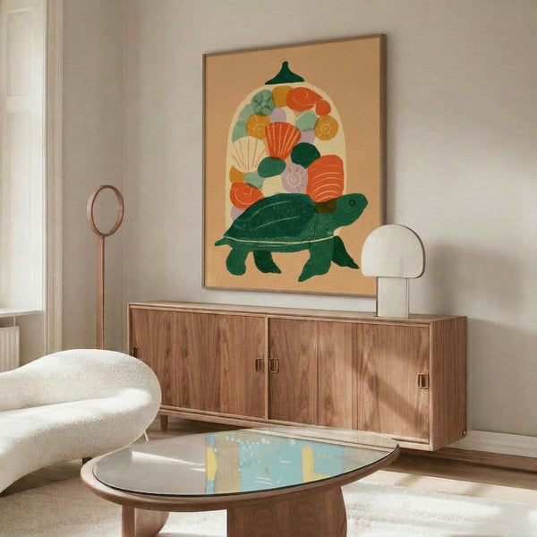 Earthy botanical print showcasing a stylized turtle surrounded by shells and floral elements in golden yellow, sage, and dusty purple; whimsical retro-boho framed wall art with contemplative charm.