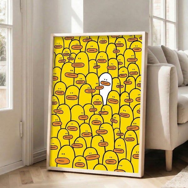 Uplifting framed art print featuring a crowd of white ducks and one glowing yellow duck with an angelic halo, blending minimalist design with vibrant pop art colors.