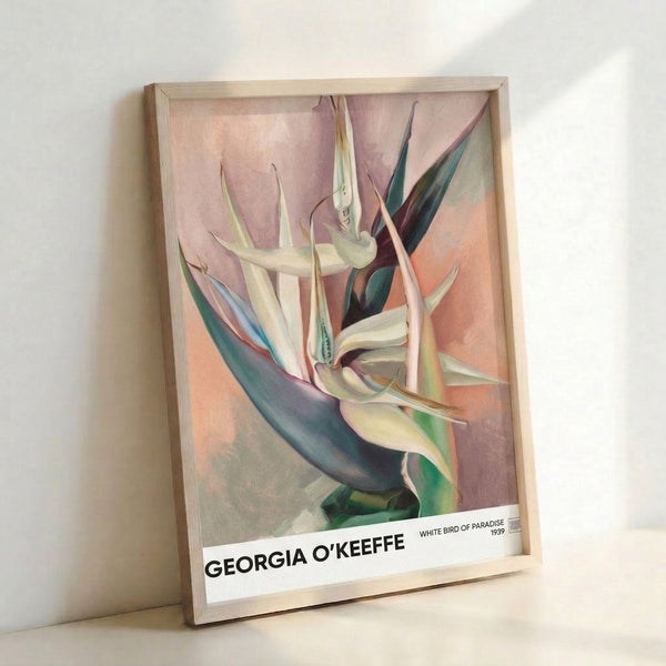 Contemplative watercolor floral art featuring a delicate bird of paradise in pale cream, sage green, and deep teal, matted and framed for sophisticated wall décor.