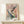 Framed watercolor art print showcasing the sensual curves of a white bird of paradise flower rendered in cream, rose, and cool teal hues on gallery-style display.