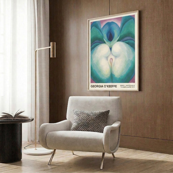 Contemporary wall art featuring softly rendered flower shapes in deep blue and sage green, creating a sensual, contemplative composition that celebrates the subtle forms of nature.