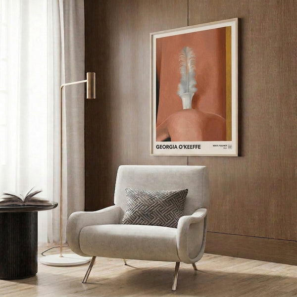 Mid-century modernist poster depicting a contemplative study of a feather and vessel in warm gold, cream, and earth-tone hues.
