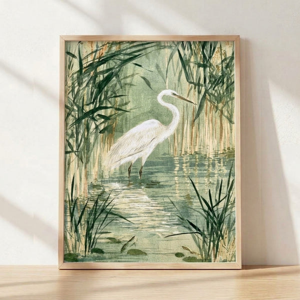 Watercolor painting of a great egret standing gracefully among tall reeds in soft sage green and cream tones, evoking a serene wetland scene with Japandi-inspired minimalist style.