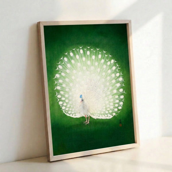 Minimalist Japanese woodblock poster of a white peacock with muted green and cream palette, creating a zen-inspired focal point on the wall.
