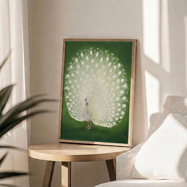 Elegant white peacock wall art in contemplative sage green and cream palette, framed print inspired by traditional Japanese woodblock printmaking.