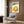 Modern poster art with a centered fried egg rendered in bright yellow and complementary black typography on a crisp white background.