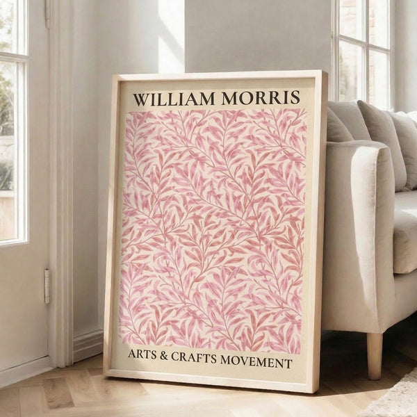 William Morris decorative botanical artwork featuring ornamental leaves and stems in soft mauve, sage, and pink tones on cream background.