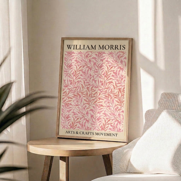 Framed botanical poster inspired by William Morris designs, showcasing intricate leaf patterns in muted pink, mauve, and sage tones.