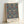Ornamental Art Nouveau pattern showcasing symmetrical botanical elements with pomegranate fruits and foliage in sophisticated deep teal and warm metallic accents, wall-mounted.