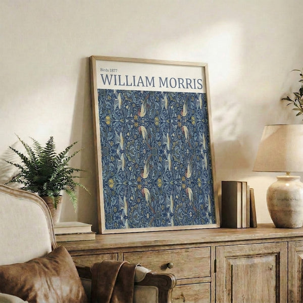 Art Nouveau wall art rendering birds and botanical elements in a harmonious repeating pattern of navy, cream, and warm metallic tones.