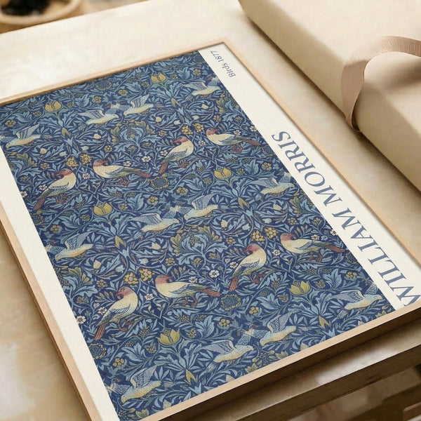 Framed botanical print capturing the serene elegance of birds and foliage in Art Nouveau style with navy, terracotta, and golden accents.