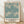 Art Nouveau framed poster featuring delicate botanical flowers and foliage in teal, sage green, and cream tones, displaying elegant organic patterns characteristic of William Morris design.