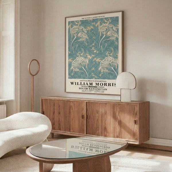 Elegant framed botanical poster with ornamental flowers and leaves in muted cream, teal, and sage hues, showcasing the organic sophistication of vintage Arts and Crafts artistry.