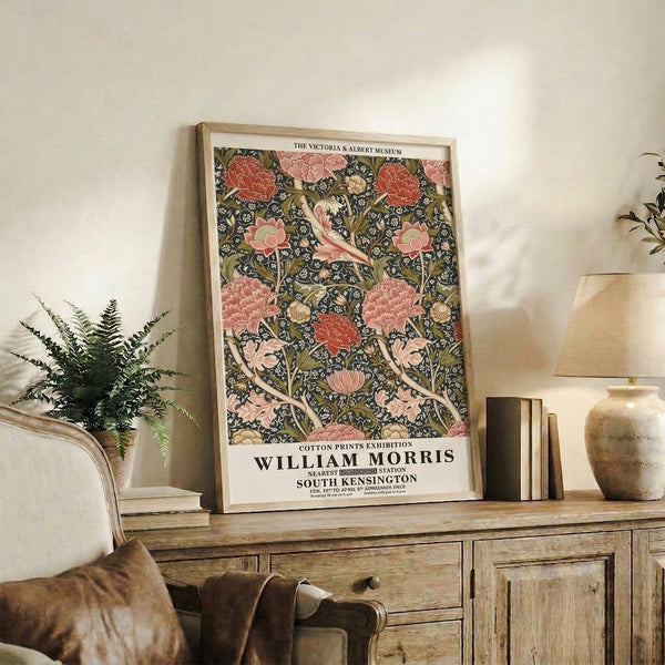 Framed Art Nouveau poster of William Morris floral design with detailed peonies and vine patterns in coral red, dusty rose, olive green, and cream palette.