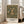 Ornamental Art Nouveau wall art depicting a serene hare surrounded by elaborate floral motifs in sophisticated cream, gold, and forest green colorways.