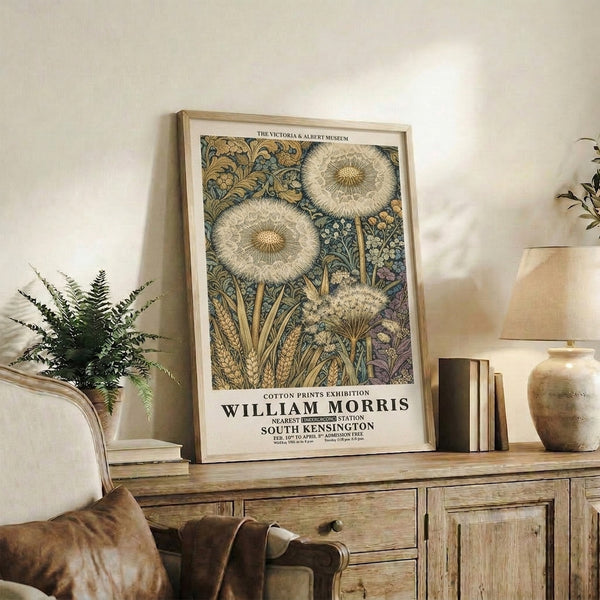 Decorative framed print with organic dandelion motif rendered in soft teal, dusty rose, and gold tones in the Art Nouveau tradition.