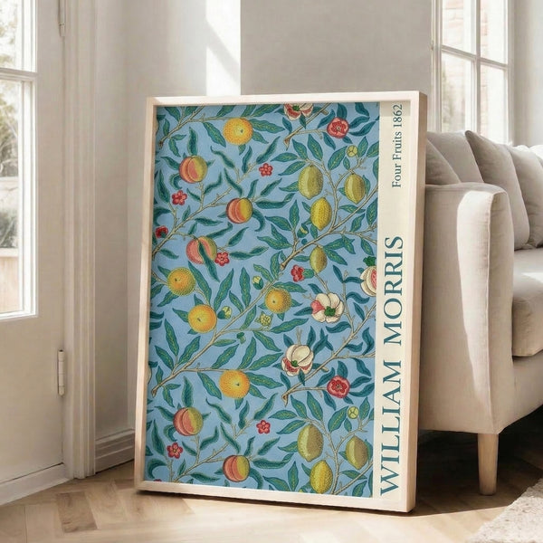 Elegant vintage botanical wall art in Art Nouveau style, depicting four fruits with flowering branches and foliage in cream, dusty blue, sage, and golden hues.