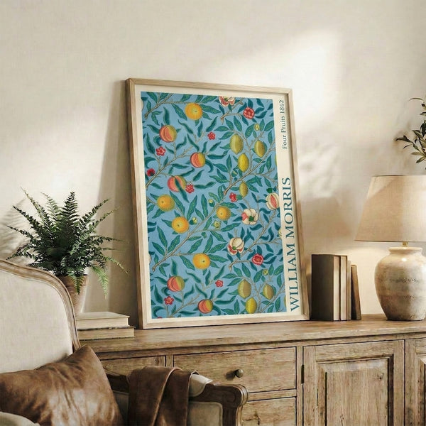 Serene fruit and flower botanical print in muted Art Nouveau palette of cream, dusty blue, sage green, golden yellow and soft coral red on framed poster.