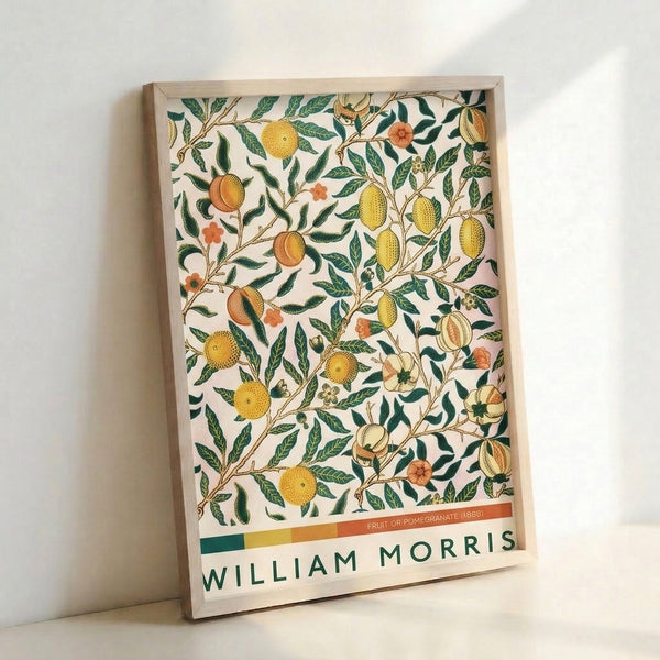 Ornamental Art Nouveau wall art showcasing pomegranate and citrus fruit with decorative foliage in sophisticated cream, green, and golden yellow palette.