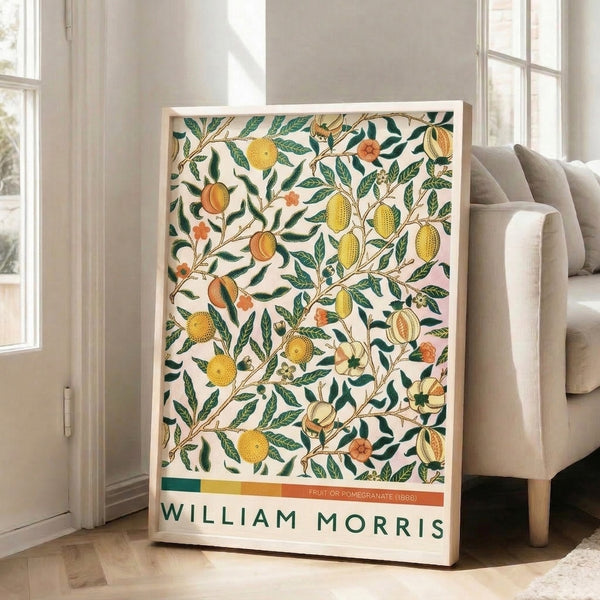 Elegant vintage fruit and botanical poster with pomegranate, lemon, and ornamental branches rendered in calming Art Nouveau style with tan and golden accents.