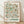 William Morris Jasmine botanical print featuring interwoven flowering vines and leaves in Art Nouveau style, rendered in cream, sage green, and terracotta tones on a framed poster.